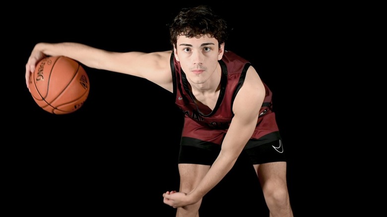 Colin Clark dribbling a basketball