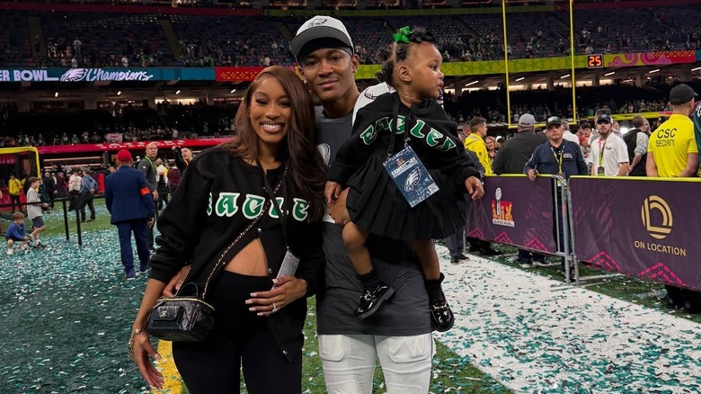 Mya Danielle, DeVonta Smith, and their daughter at the Super Bowl