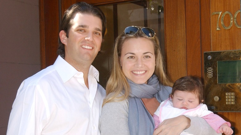 Kai Trump as a baby with parents