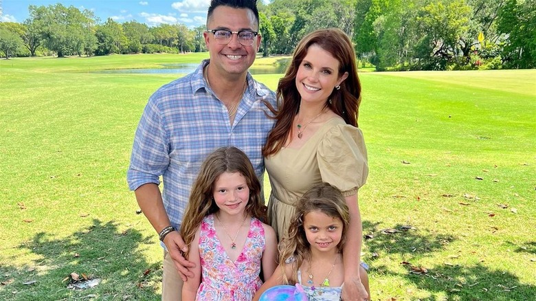 Nick Swisher, JoAnna Garcia Swisher, Emerson, and Sailor smiling