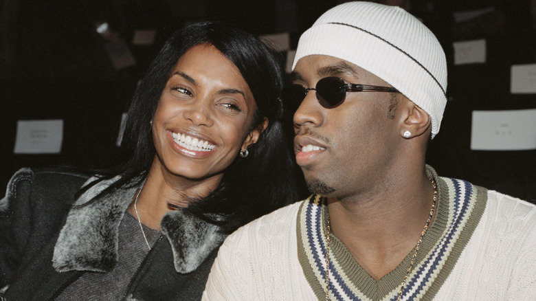 Kim Porter smiling Sean Diddy Combs