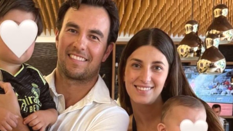 Carola Martina with Sergio Perez and their children