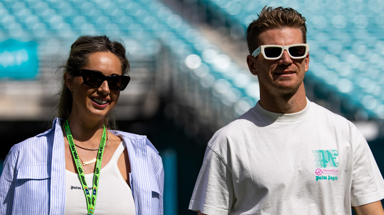 Eglė Ruškytė walking with Nico Hulkenberg in Miami, Florida, in May 2024