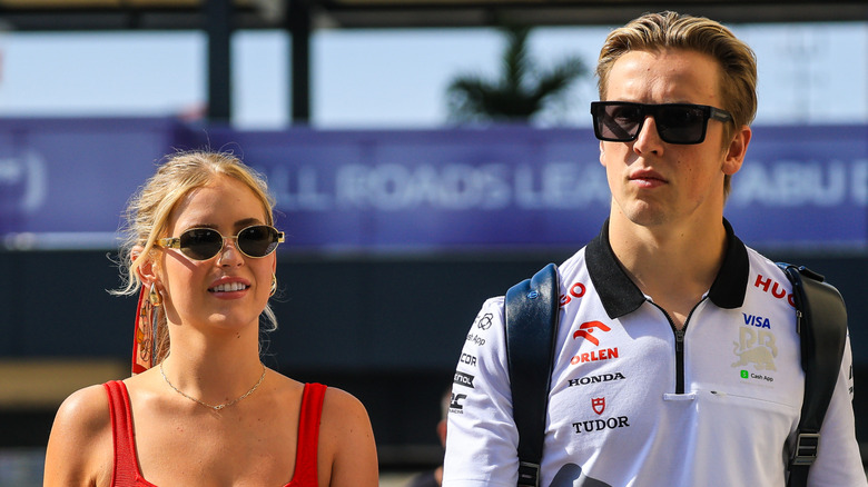 Hannah St. John walking with Liam Lawson in Abu Dhabi in December 2024