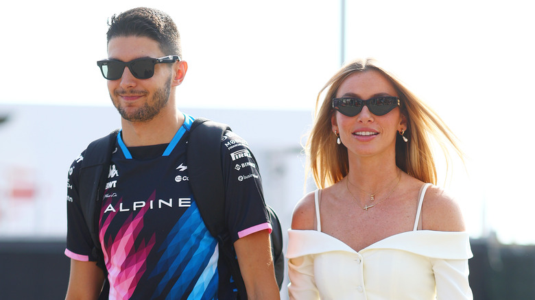 Flavy Barla walking with Esteban Ocon in Monza, Italy, in September 2024