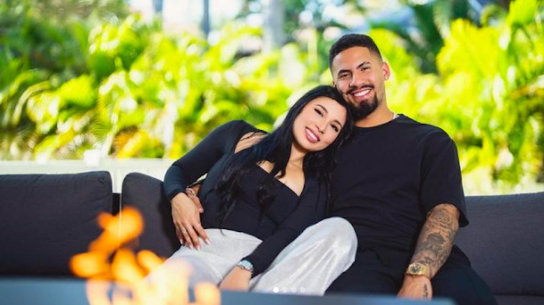 New York Yankees second baseman Gleyber Torres with wife Elizabeth sitting outdoors