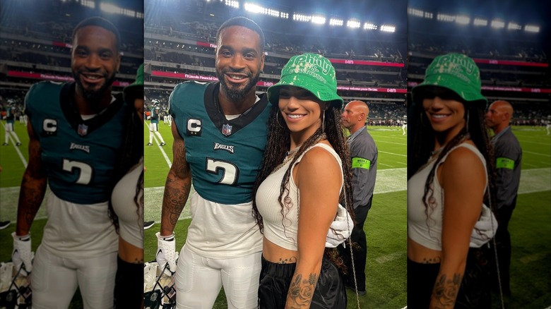 Darius and Jennifer smiling on the field