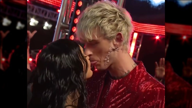 Megan Fox and Machine Gun Kelly with tongue out