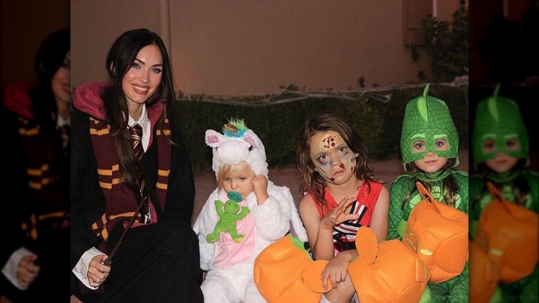 Megan Fox poses with her three sons