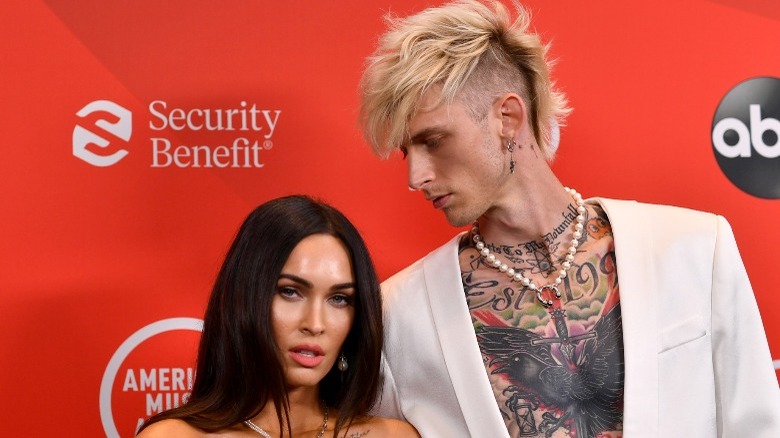 Machine Gun Kelly looking at Megan Fox