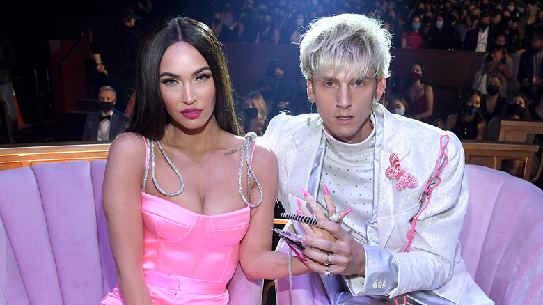 Machine Gun Kelly and Megan Fox attend the iHeart Radio Music Awards