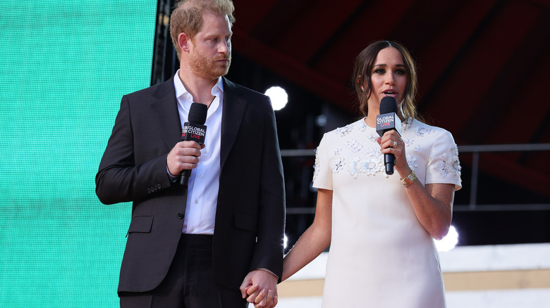 Prince Harry and Meghan Markle on stage