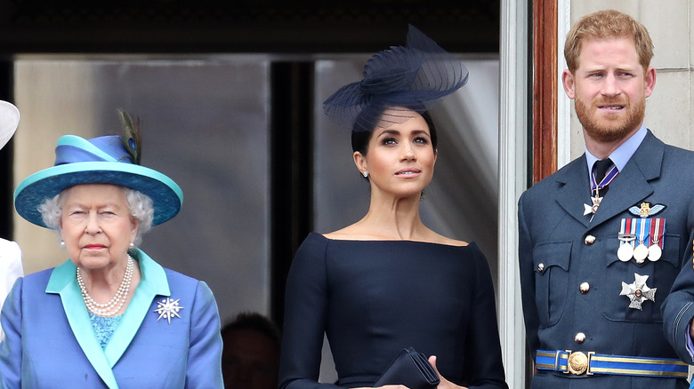 Queen Elizabeth, Meghan Markle, and Prince Harry