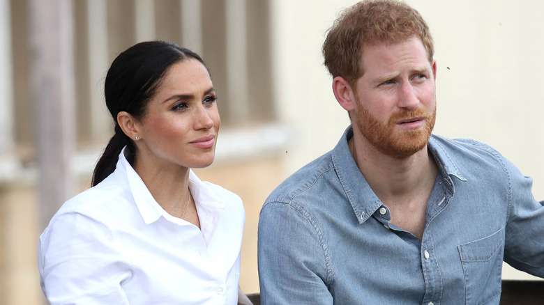 Meghan and Harry looking focused