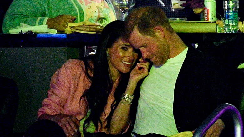 Meghan Markle Prince Harry cuddling