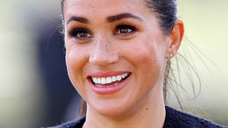 Meghan Markle ponytail smiling 