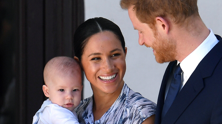 Archie, Meghan Markle, Prince Harry smiling