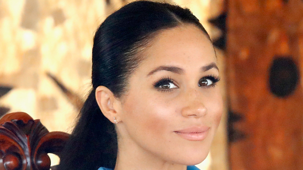 Meghan Markle wearing a ponytail at an event
