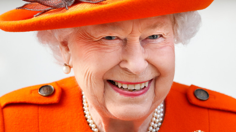 Queen Elizabeth posing and smiling