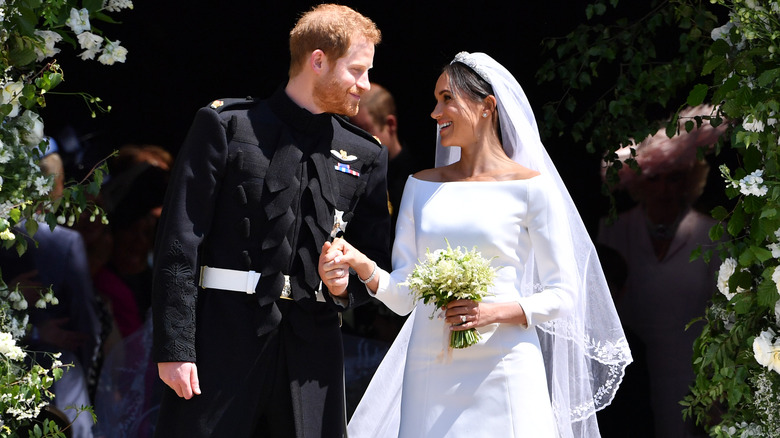 Prince Harry and Meghan Markle looking at each other