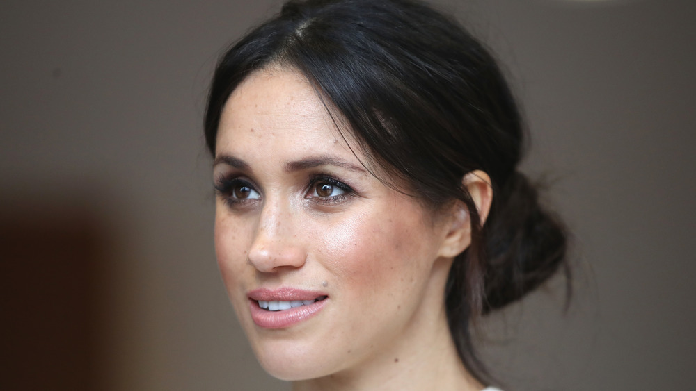 Meghan Markle wearing her hair in a bun