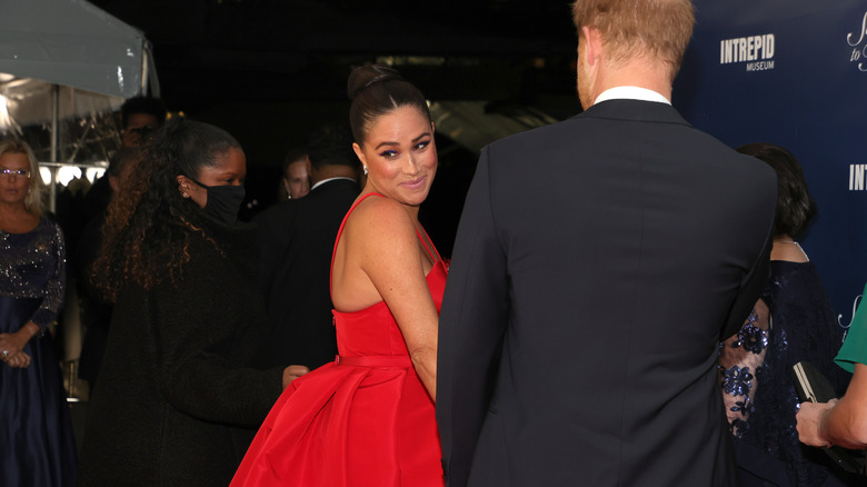 Meghan Markle looking behind her