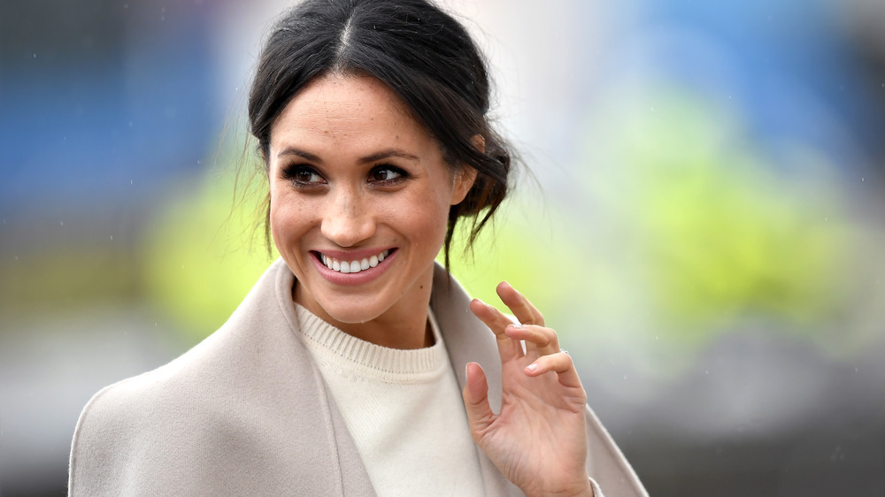 Meghan Markle waving to the crowd