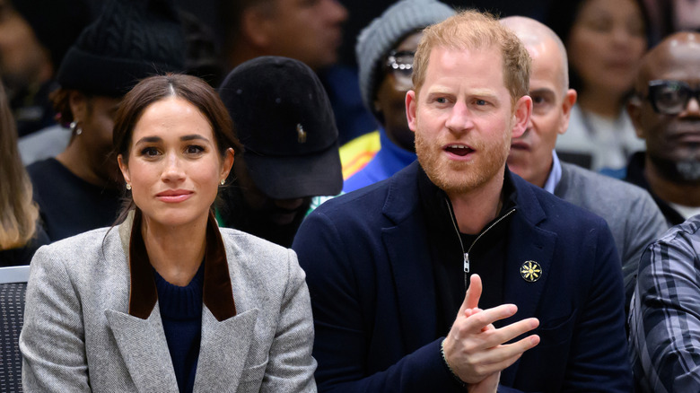 Meghan Markle and Prince Harry sitting together