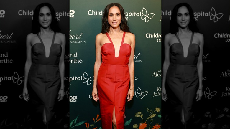 Meghan Markle wears a red dress outfit