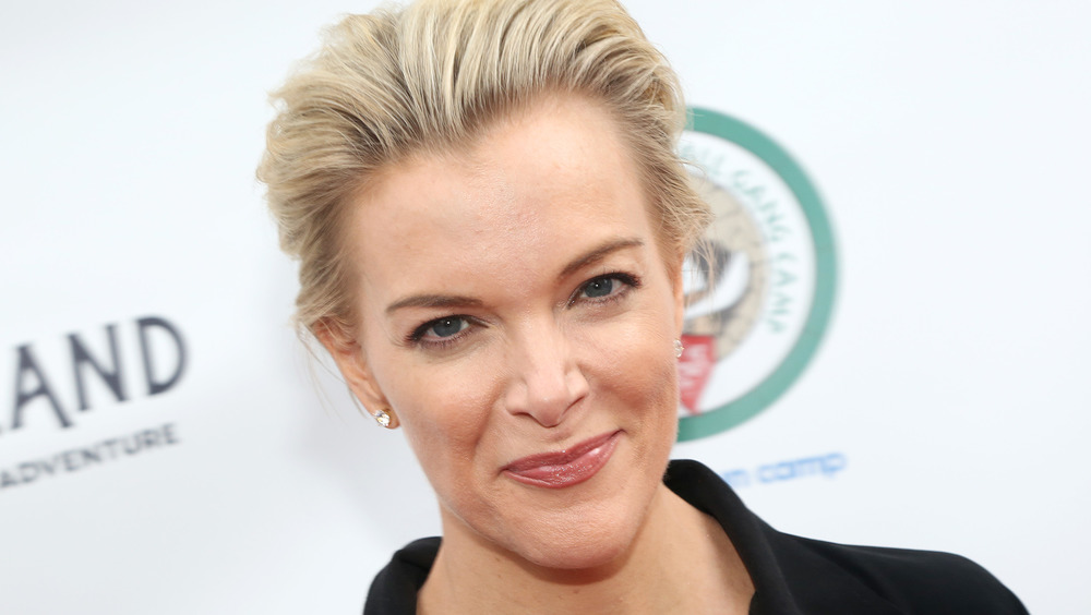 Megyn Kelly smiling on the red carpet at an event