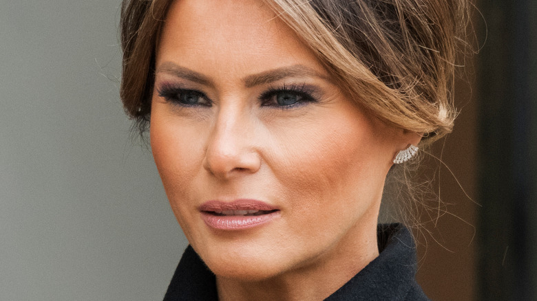 Melania Trump reacts at an event