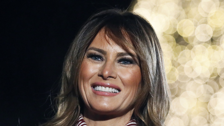 Melania Trump showing her teeth by smiling