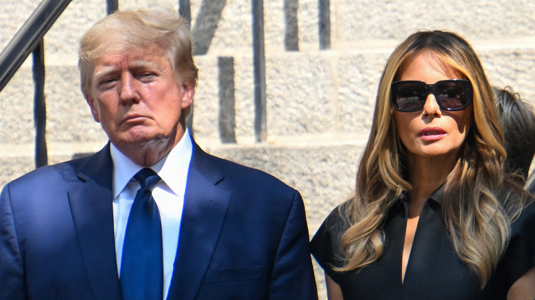 Donald and Melania Trump staring