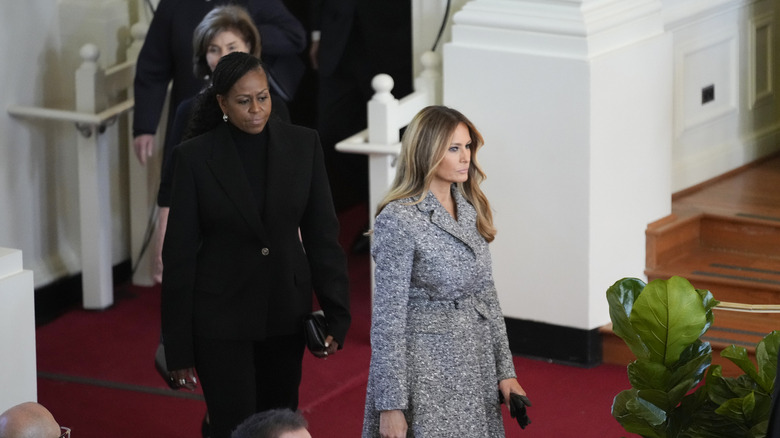 Melania Trump walking into Rosalynn Carter's memorial