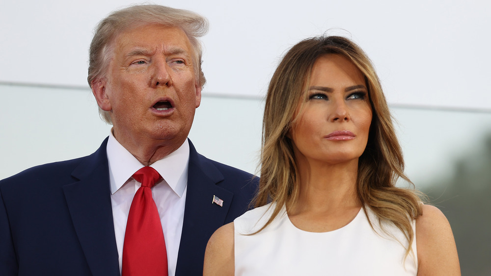 Donald Trump and Melania Trump staring off