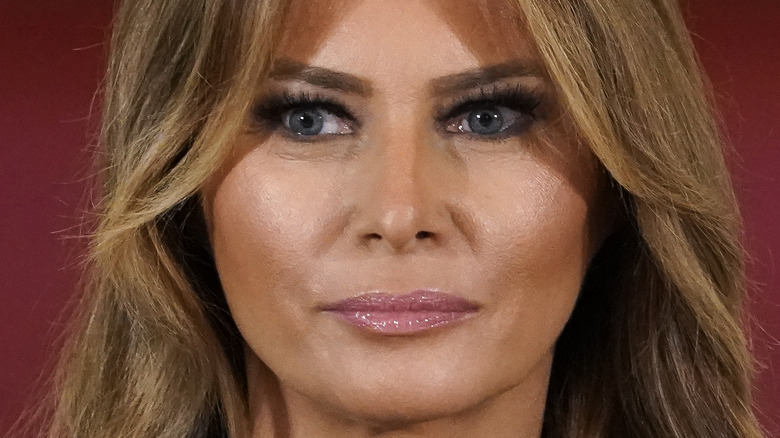 Melanie Trump with a neutral expression