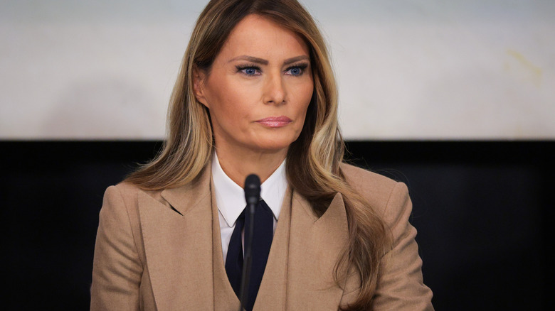 Melania Trump wearing a tan suit