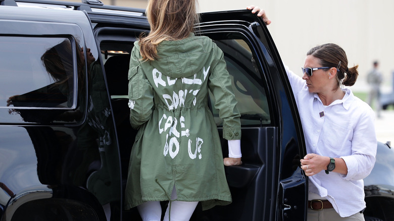 Melania Trump wearing green jacket