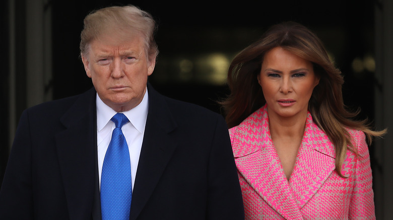 Donald Trump and Melania Trump walking