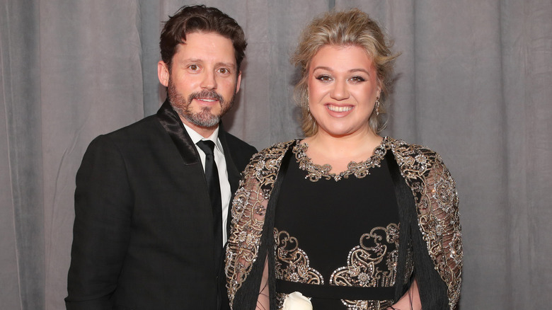 Brandon Blackstock and Kelly Clarkson posing