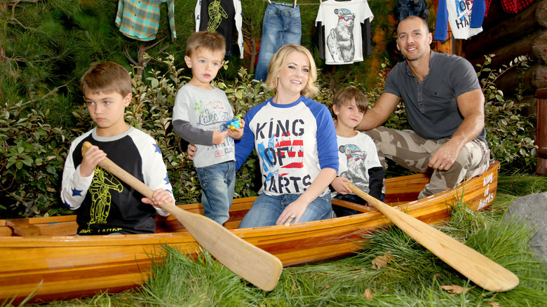 Melissa Joan Hart posing with her kids 