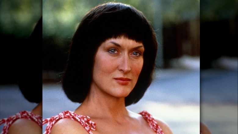 Meryl Streep wearing black wig