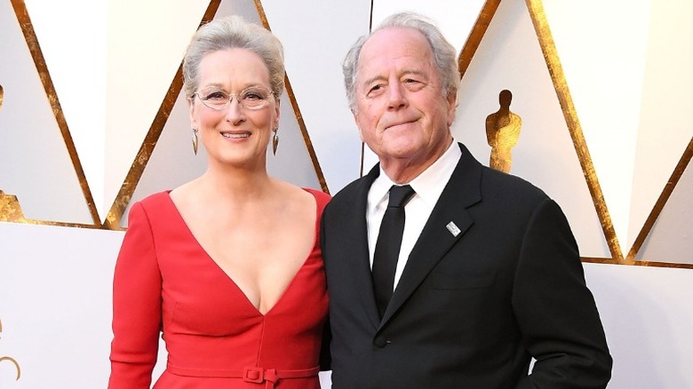 Meryl Streep and Don Gummer smiling on red carpet