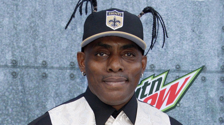 Coolio wearing a hat