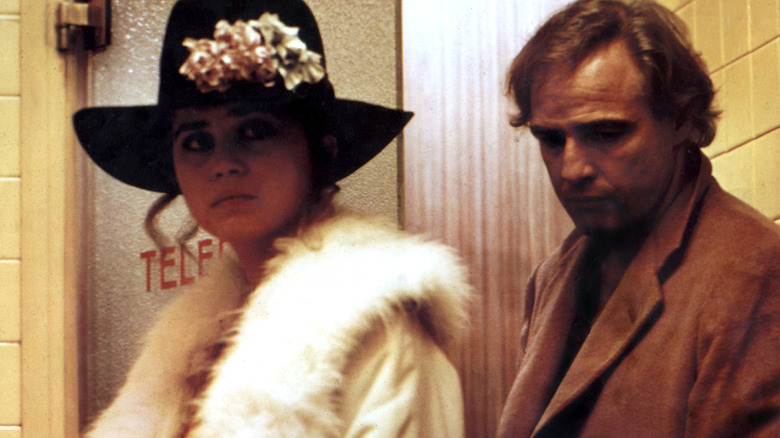 Maria Schneider and Marlon Brando frowning 