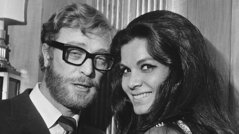 Bearded Michael Caine next to Brazilian actress Florinda Bolkan