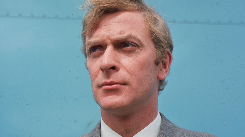Michael Caine with his hair sticking up