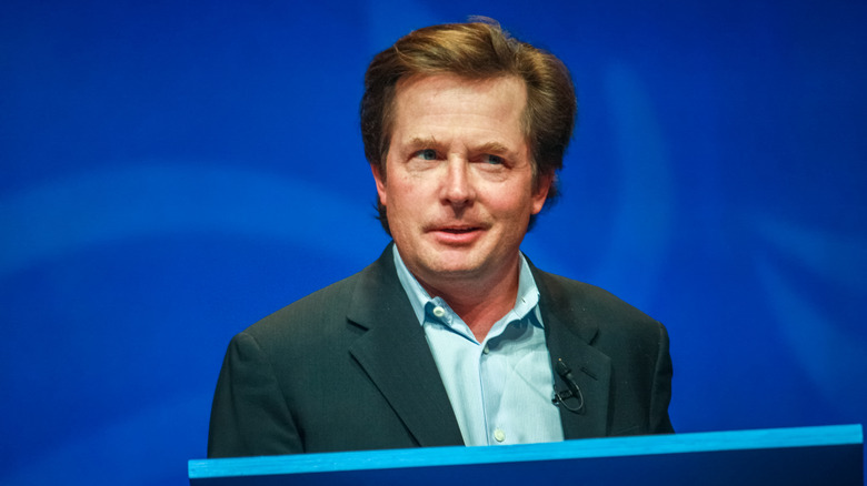 Michael J. Fox speaking at an event