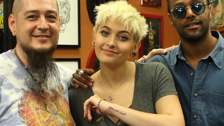 Paris Jackson showing wrist tattoo