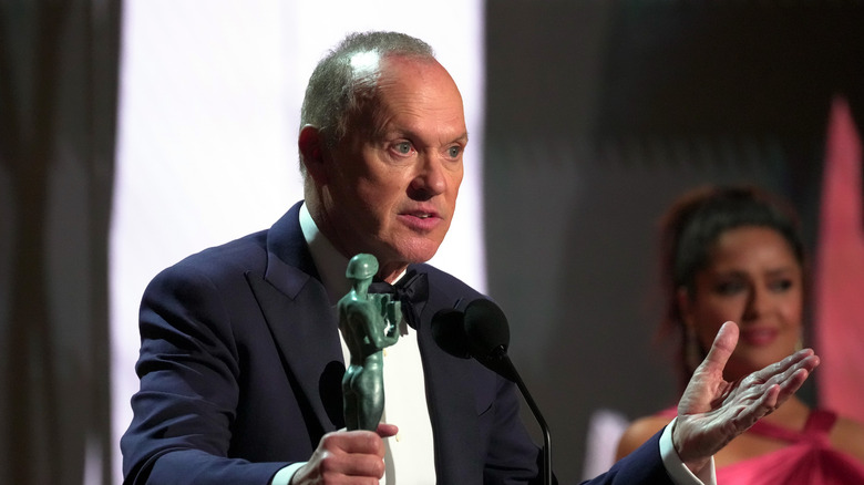 Michael Keaton accepts an award 